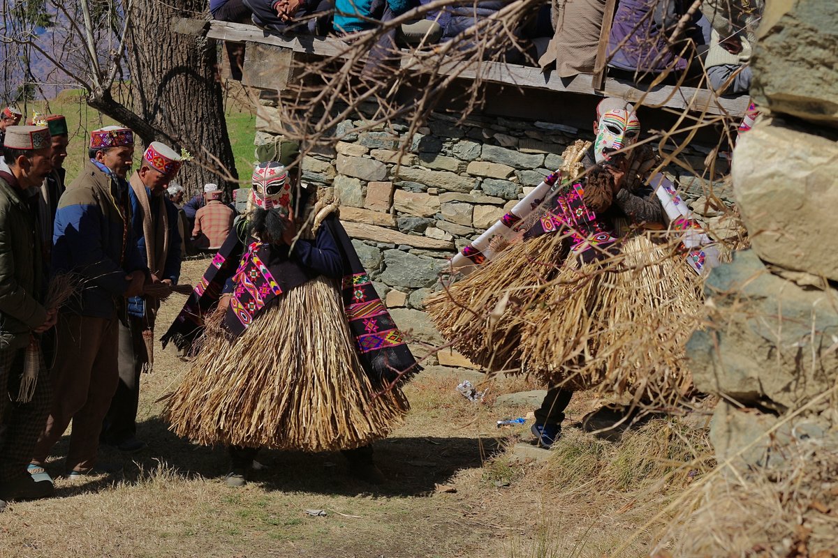 Villagers in traditional dress celebrating Fagli near Chehni Kothi