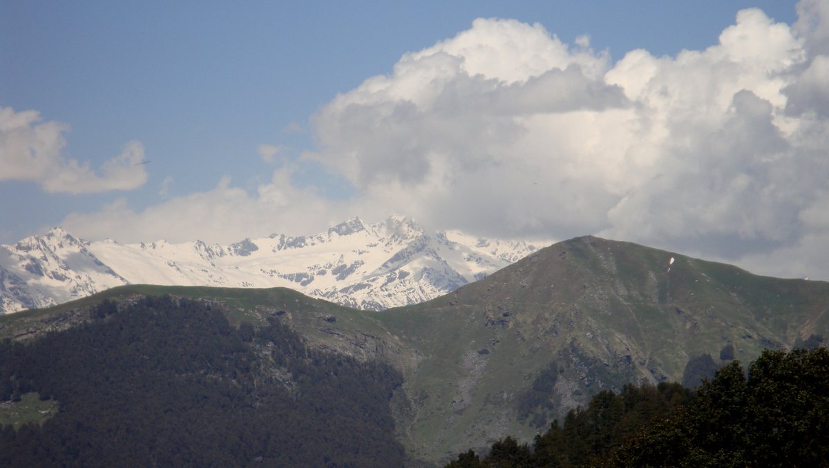 Snow peaks of the Himalayan range seen from Jalori Pass