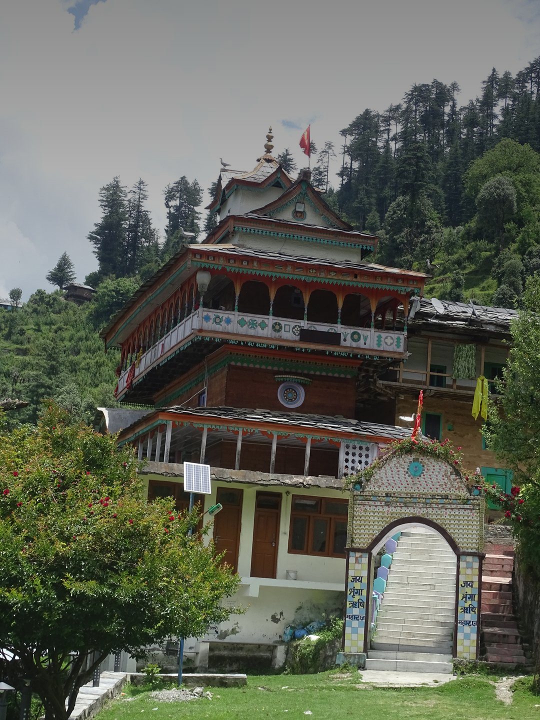 The Shringa Rishi temple at Bagi, Banjar, with tiered roofs and carved wooden balconies