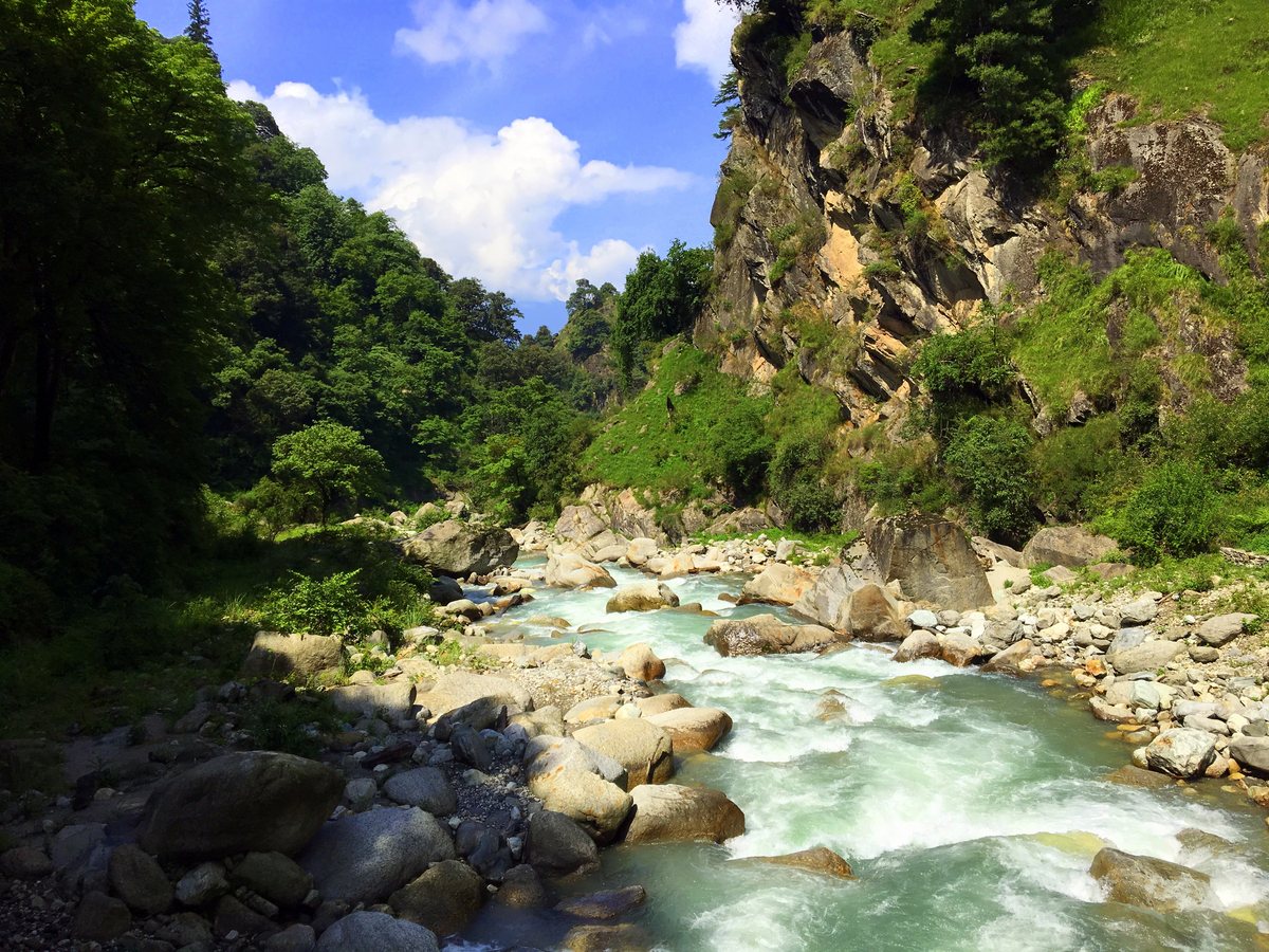 The clear, rocky Tirthan river in Tirthan Valley