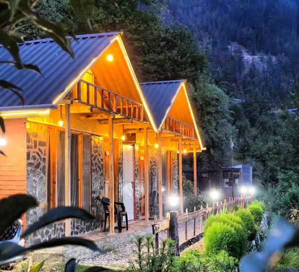 Mudhouses lit up at dusk